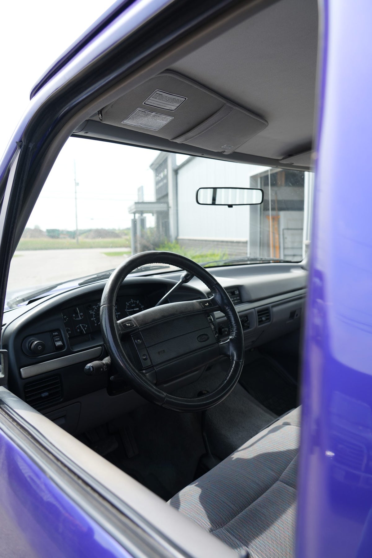 1995 Ford F-150 sweepstakes truck - cab interior and steering wheel